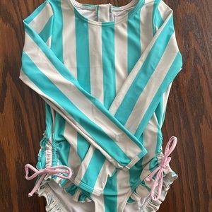 Seeethoney long sleeve bathing suit. Very washed out from sun, chlorine, etc.